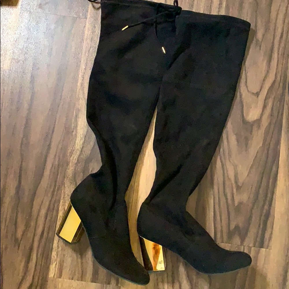 Steve Madden High Knee Black Boots.